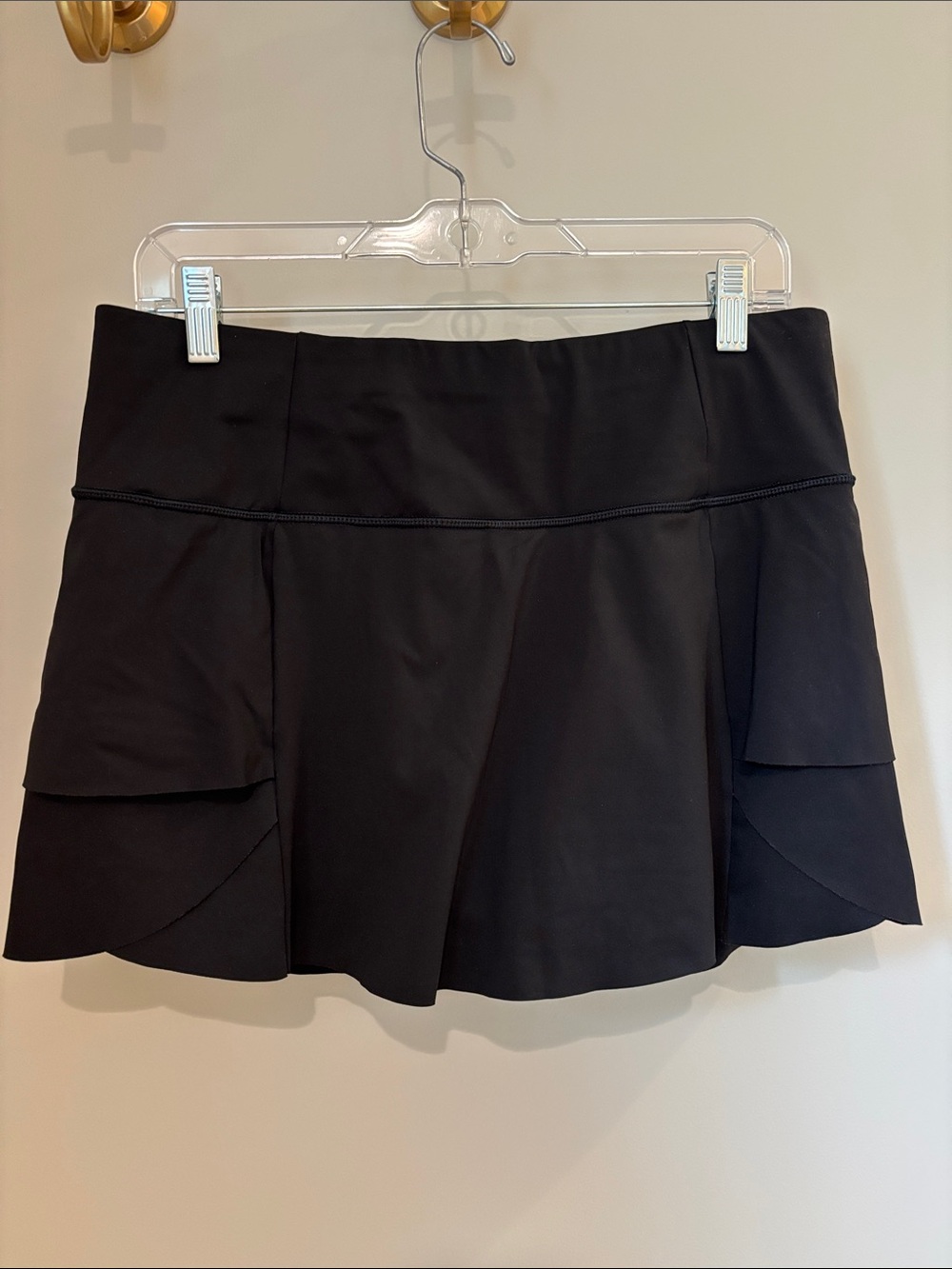 Athleta Momentum Ruffle Skort in black; size M